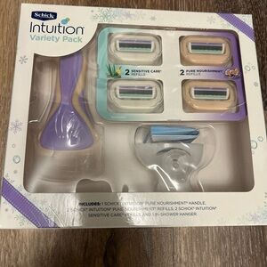 Schick Intuition 6pc Gift Set (includes 1 Handle, 4 Refills, and 1 Holder)